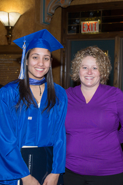 Student speaker Nicole Marie Reyes-Molina, with Sarah S. Moore, her mentor and Disability Services sign language interpreter.