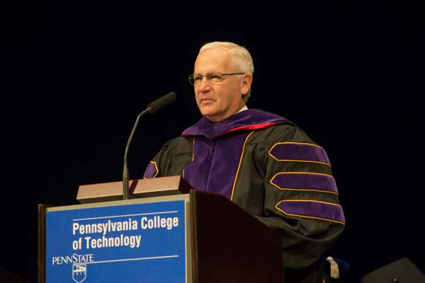 ... before expressing his gratitude, as well as his congratulations to the day's graduates.