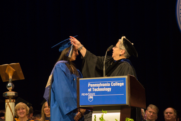 As the tassel turns, another group of students instantly transforms into alumni.