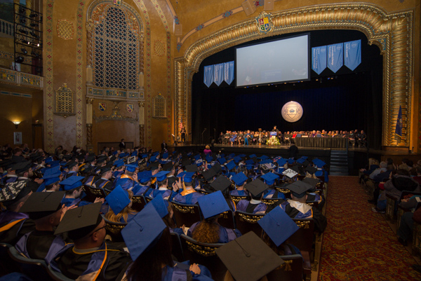 ... as graduates fill the choicest seats in tribute to their success.