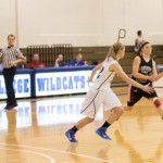 Alicia Ross, who scored 15 points on the night, defends her home court.