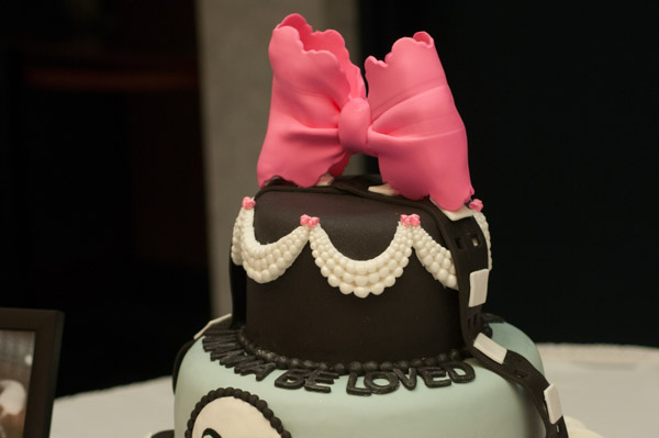 A hand-molded bow and pearling adorn Uribe's creation ...