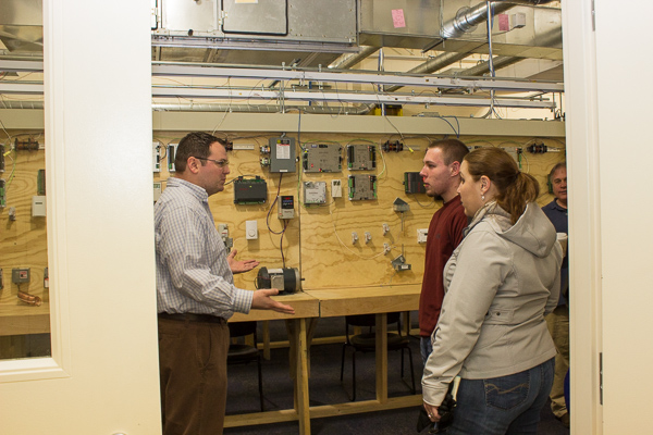 Adam J. Yoder, a 2011 graduate in building automation technology, returns to campus as an alumni volunteer.