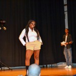 Nursing major Chesnya I. Cherulus, of Elmont, New York, lets loose her inner nerd. At right is the evening's emcee, Antony Griffin-Betterson, of Philadelphia, studying residential construction technology and management.