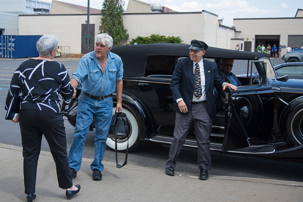 President Davie Jane Gilmour welcomes Jay Leno to campus. He arrived in a 1937 Packard convertible sedan with a custom Dietrich body, driven by its owner, Claude Williams. Herb Seltzer (right) served as the doorman. Williams and Seltzer are members of the Susquehannock Region of the Antique Automobile Club of America, closely aligned with the college's restoration major.