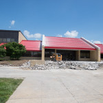 The red roof will remain, but a vastly new look – including glass panels etched with the college seal – will soon greet visitors to the LEC.
