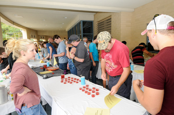 Katelynn M. Watson, of Williamsport, a culinary arts and systems major, serves up her Strawberry Melon Ball