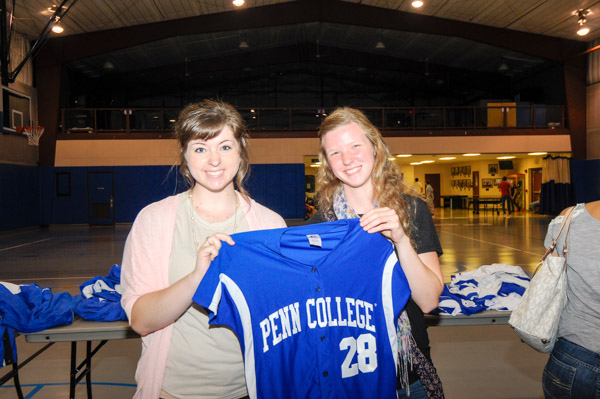 Baking and pastry arts majors Keegan D. Sonney (left), of Erie, and Sarah I. Tielmann, of Tatamy, check out the selection.