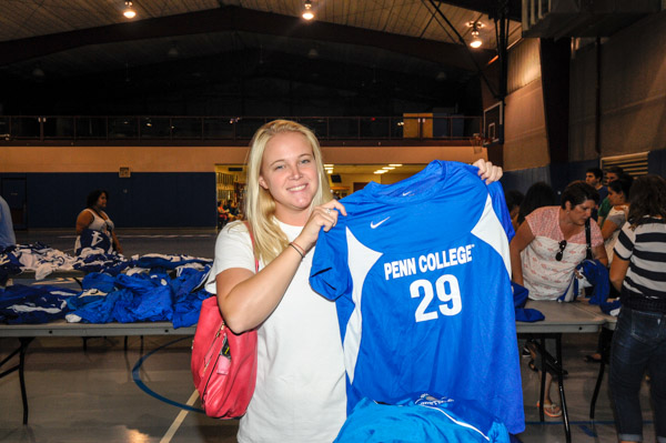 Among the shoppers is Leanda J. Hill, a 2008 graduate in culinary arts technology.