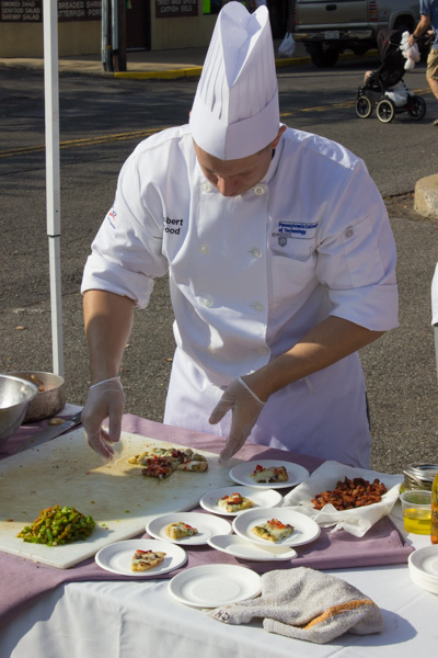 Robert E. Wood, of Montoursville, is among the Catering students on hand at the Williamsport Growers' Market on Saturday.