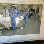 Students pose for a remote photo opportunity after they finish their scenario.