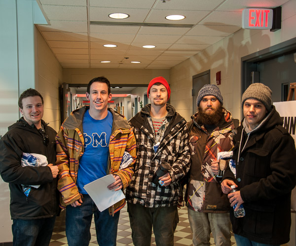 Community service assignments in hand, the Phi Mu Delta brotherhood stands ready to contribute.