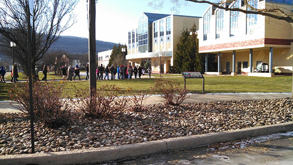 Walkers file into the Bush Campus Center before fanning out to area nonprofits for service projects.