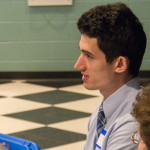 A student listens to the input of others in his group.