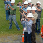 ... while capturing the simulation on cellphone cameras.