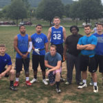 Emerging victorious from a Homecoming tradition, a team of upperclassmen ...