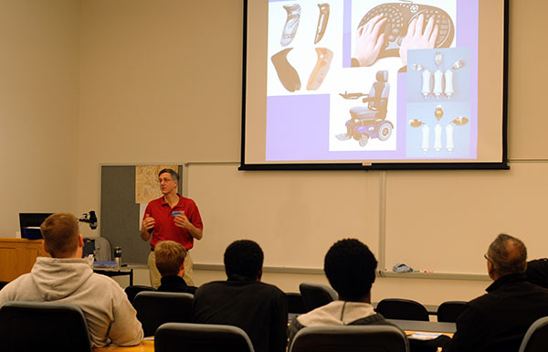 Thomas E. Ask, professor of industrial design, illustrates the major's boundless world of opportunity.