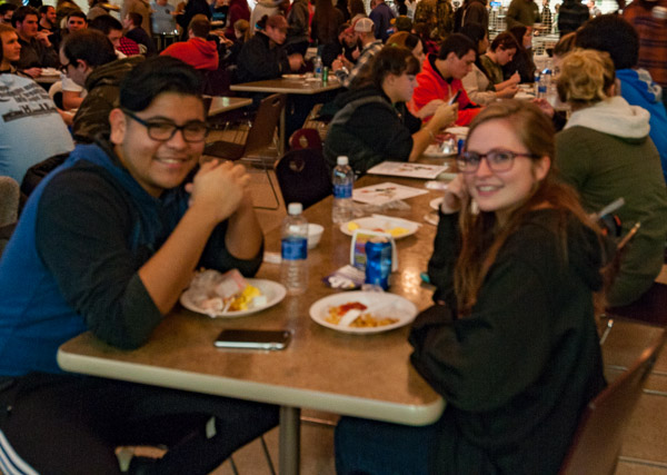 Graphic design students Daniel Mendoza, of Red Hook, N.Y., and Sydney O. Powell, of Linden, enjoy late-night refreshment.