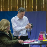 Thomas E. Ask, industrial design professor, and Via's mother, Rona, check out the "trashion" accessories.