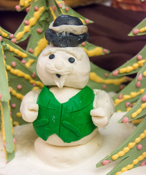 A chocolate replica of the Burl Ives-voiced narrator from the “Rudolph the Red-Nosed Reindeer” television special joins the show, courtesy of Katie M. Weakland.