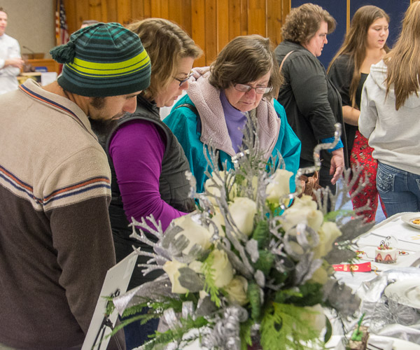 Food Show visitors view intricate plated desserts.