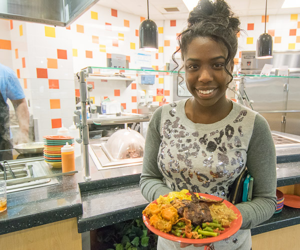 Nursing student Serecia S. Durson, of Beaver Meadows, prepares to enjoy the evening's cuisine.