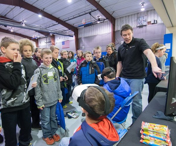 Fifth-graders wait their turn with the virtual-reality headsets.