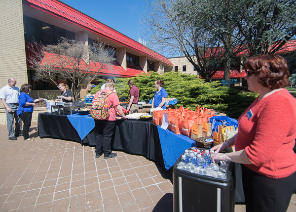 A touch of signature orange accents the Wildcat blue on the KDR courtyard patio.