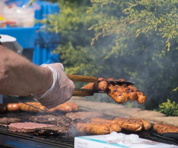 The patio fills with the succulent smells of outdoor grilling.