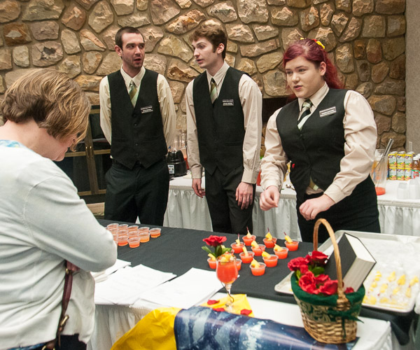 Somer A. Safford, of Port Allegany, describes her “mocktail” to Myra K. Shaffer, institutional advancement and foundation assistant. Joining Safford are Beverage Management Service and Controls classmates Sean E. Creegan (left), of East Petersburg, and Therrien.