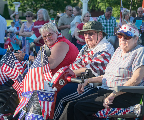 Whether on foot power or some other means of transport, fans of the Stars and Stripes make their way to campus.