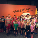 Campers cross the river for some interactive (and educational) Little League fun.