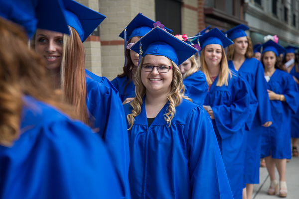 It’s all smiles processing into the Community Arts Center.