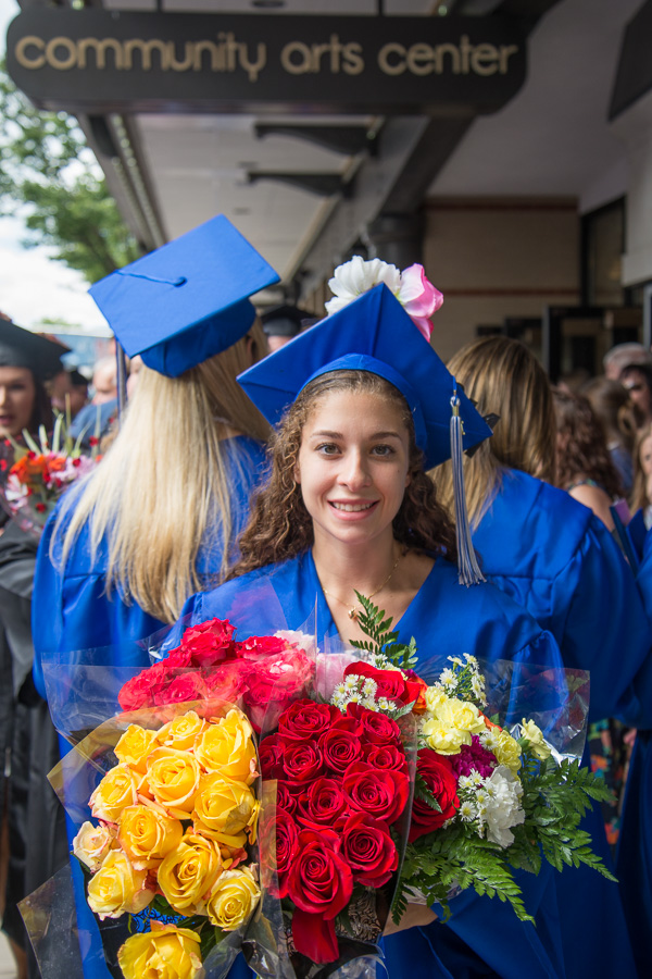 Overflowing with flowers is Elizabeth S. Digan, of Trout Run, occupational therapy assistant.
