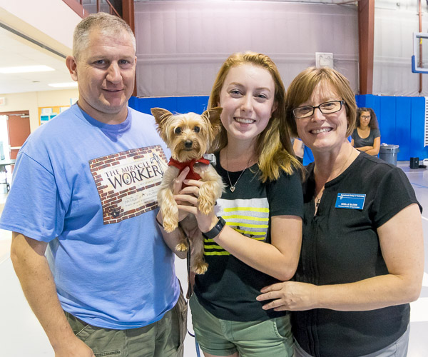 Noelle B. Bloom (right), Dining Services' assistant director, poses with her family – including
