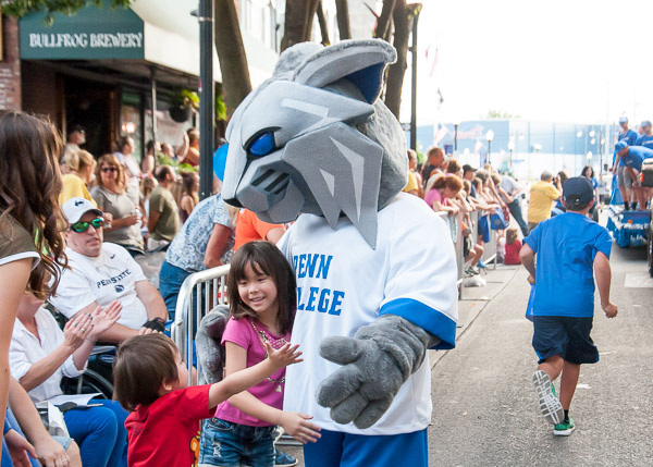 A youngster observes an impromptu Hug-a-Mascot Day.