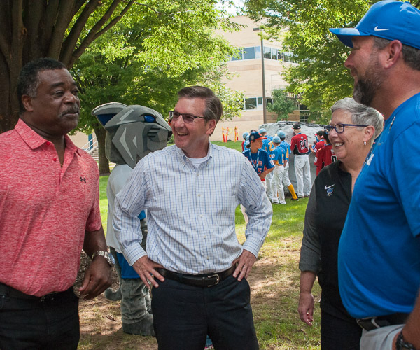 Murray (left) elicits laughs from Little League International President/CEO Steve Keener, President Gilmour and coach Howard.