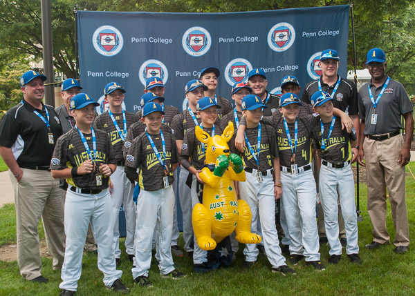The Australia representatives take a photo with a mascot of their own.