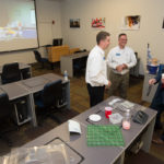 "Plastics" is the word in this discussion facilitated by Plastics Innovation & Resource Center staff Brennan B. Wodrig (left) and Christopher J. Gagliano (center).