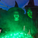 Brewing up their special brand of sorcery, witches add to the seasonal chill.