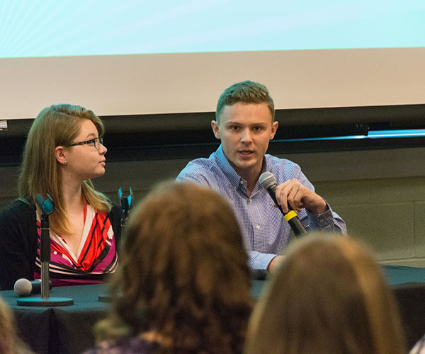 Kyle M. Landis, a student in business administration: banking and finance concentration, answers a high school student’s question about his internship experience. Landis, of Troy, was part of a three-member panel that also included Cassandra D. Henderson (left) of Hazel Hurst, who is also studying business administration: banking and finance, and Joshua D. Lyman, of Williamsport, who earned two associate degrees – in accounting and legal assistant paralegal – in May.