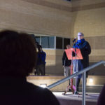 President Davie Jane Gilmour and Caleb E. Cartmell (background), of Honesdale, president of the Student Government Association and an automotive technology management major, deliver holiday goodwill.