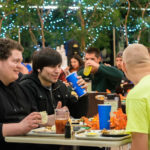 Friends break bread, before breaking ranks for a holiday at home.