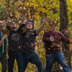 Communing with nature at the peak of autumn are (from left) alumnus and Cru intern Caleb G. Schirmer; Penn College students Jacob C. Snyder and Timothy L. Pegg; and, from Liberty University, Todd Robatin.