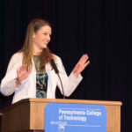 “Praise God the four years are over,” says student speaker Nicole M. Mestach, of Watsontown.