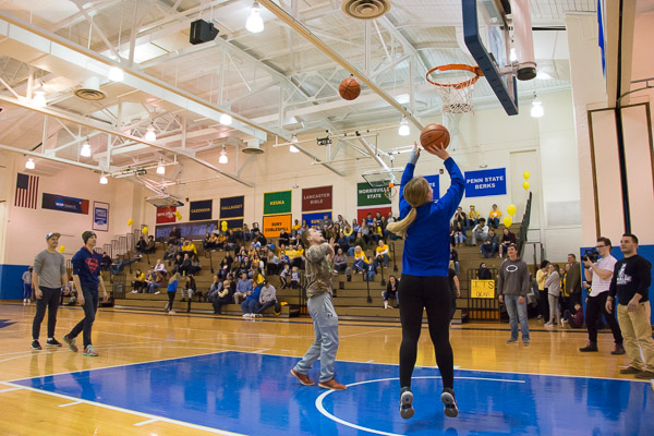 During interstitial competition, Wildcat student-athlete Sophie M. Coldsmith shows that volleyball isn't her only skill.