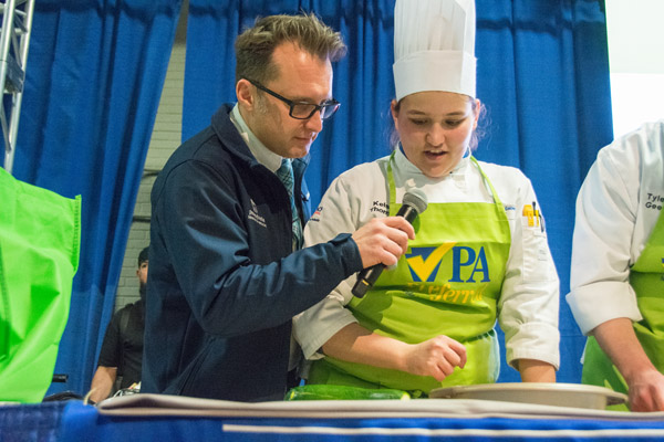 Patrick Andrews, division chief of markets for the state Department of Agriculture, asks Thomas about Team Ninjas with Cupcakes’ strategy.