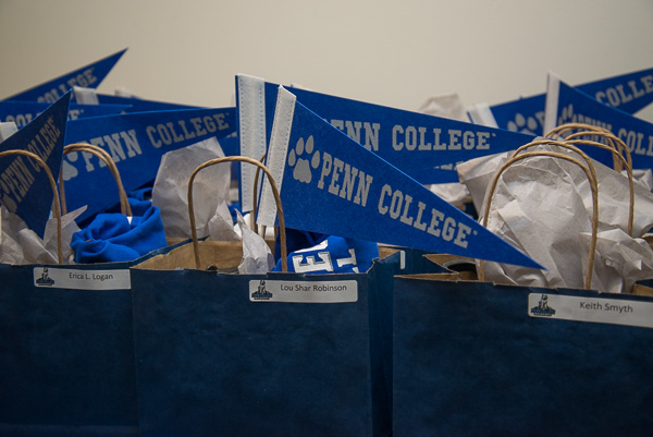 Gift bags filled with Wildcat gear await visiting alumni.