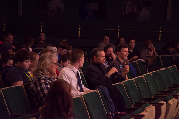 Offering their critique (and their encouragement) from a stage-front vantage, the evening's judges are (from left) Chef Monica J. Lanczak, instructor of baking and pastry arts/culinary arts; Caleb E. Cartmell, Student Government Association president; Joseph E. LeBlanc, assistant professor of physics; and Jacob T. Bowers, WEB chair.