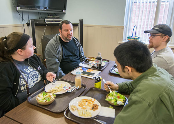 Sammie L. Davis, Samuel J. Pham and Michael V. Saylor, of Gettysburg, talk with Jon Hagan over lunch.